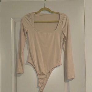 Women’s cream bodysuit